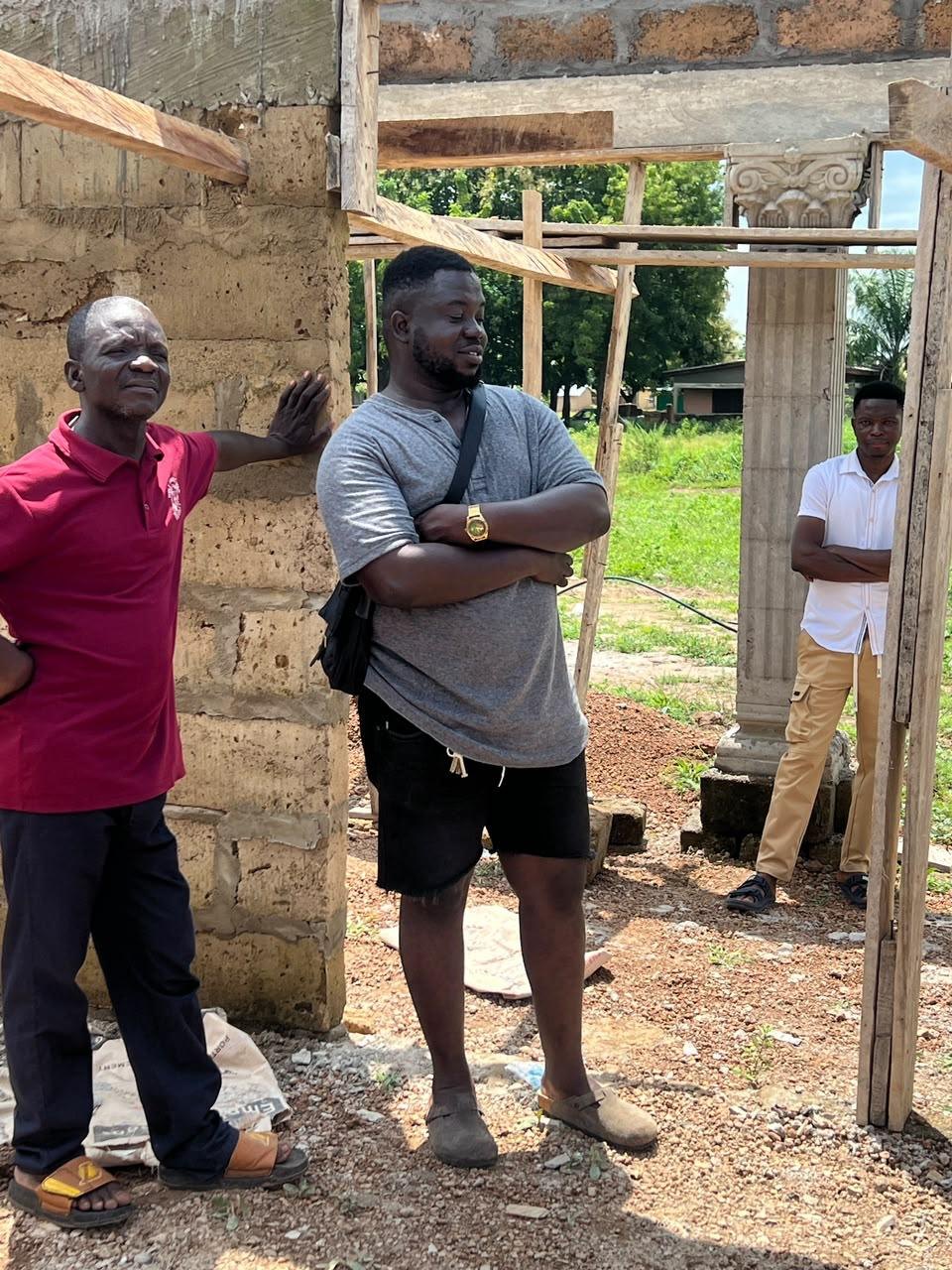 Members of the visiting team and local partners at the construction site